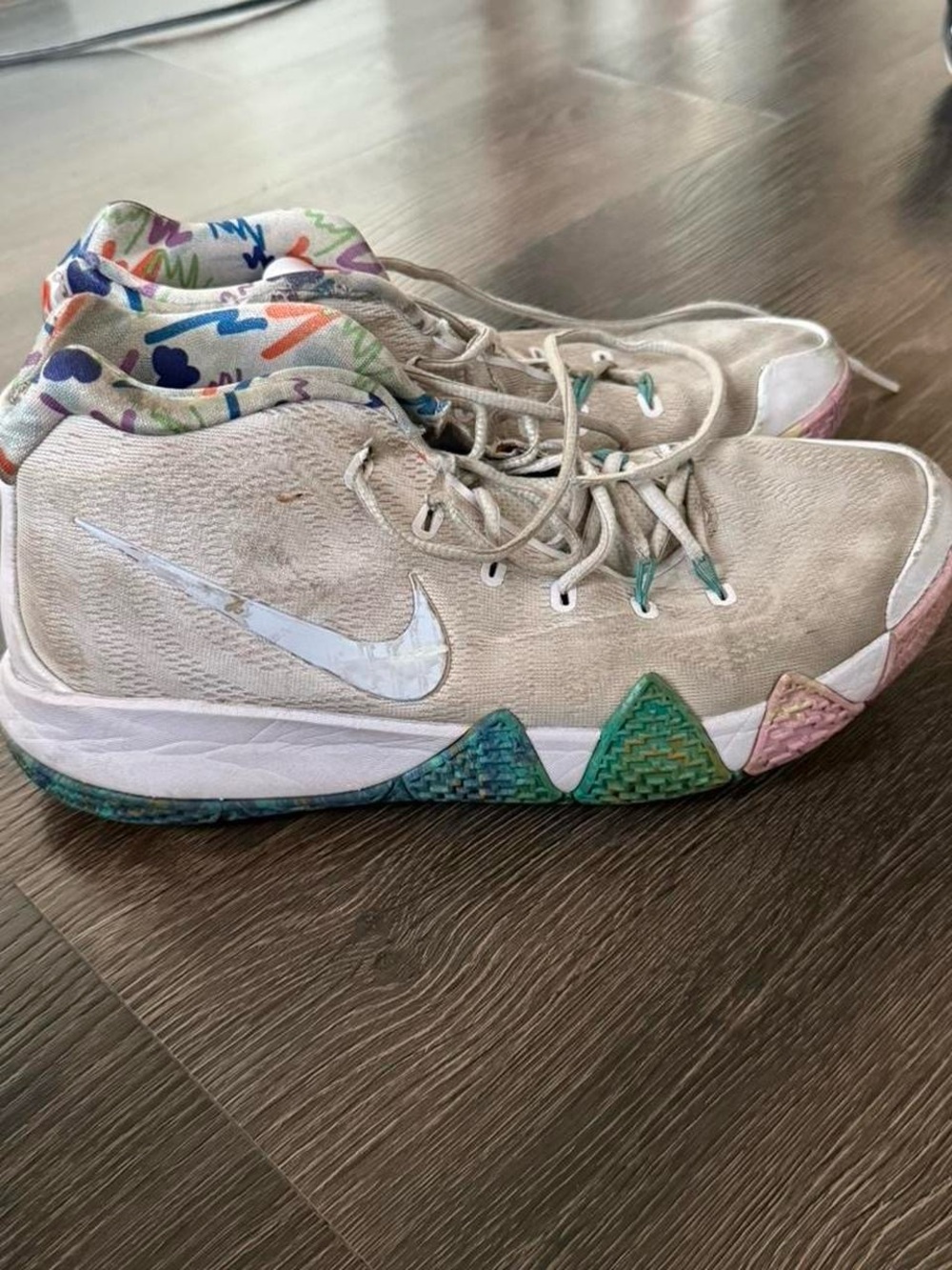 Nike Beige High-Top Basketball Shoes with Multicolor Accents